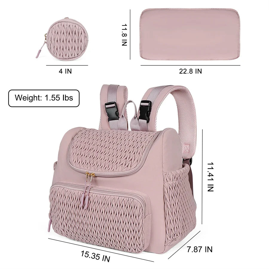 Quilted diaper bag backpack with changing pad and pacifier case