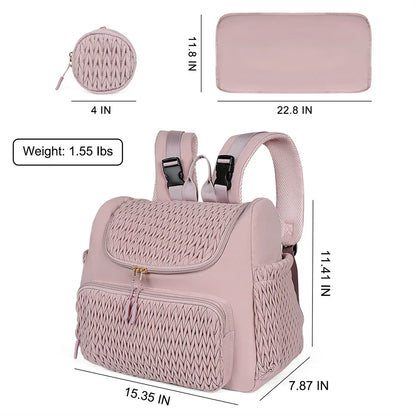 Quilted diaper bag backpack with changing pad and pacifier case