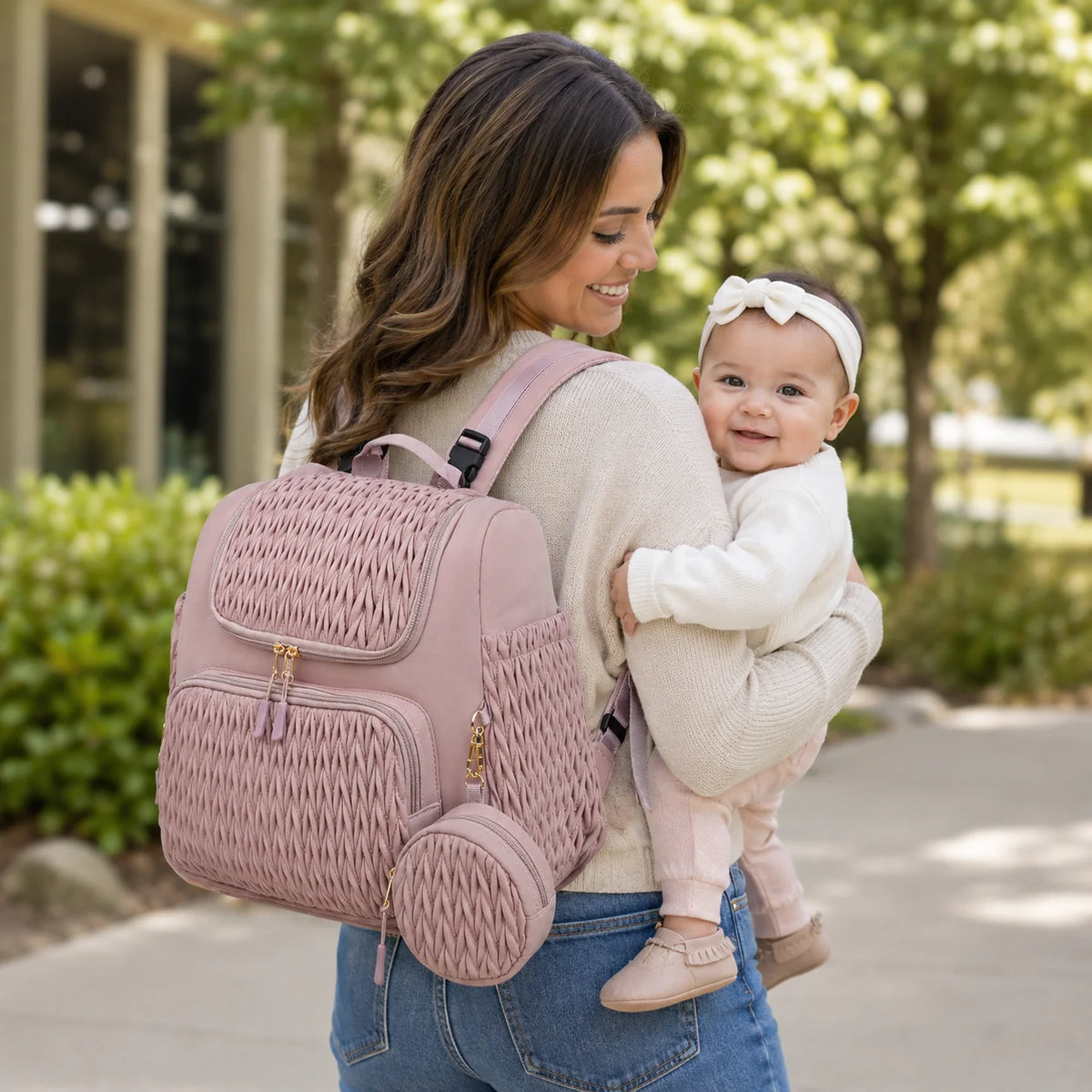 Quilted diaper bag backpack with changing pad and pacifier case