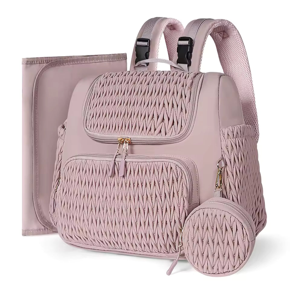 Quilted diaper bag backpack with changing pad and pacifier case