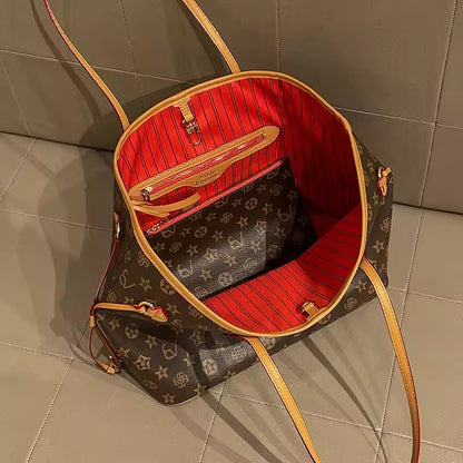 Red striped interior of brown tote showing zip pocket and matching pouch